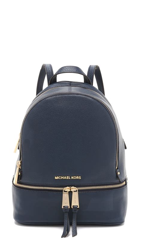 navy blue michael kors backpack|blue michael kors backpack purse.